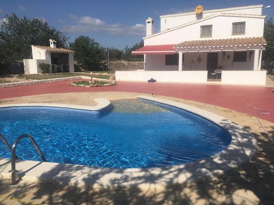 Foto 1 de Casa rural en venda a calle Partida Racollet de 4 habitacions amb terrassa i piscina