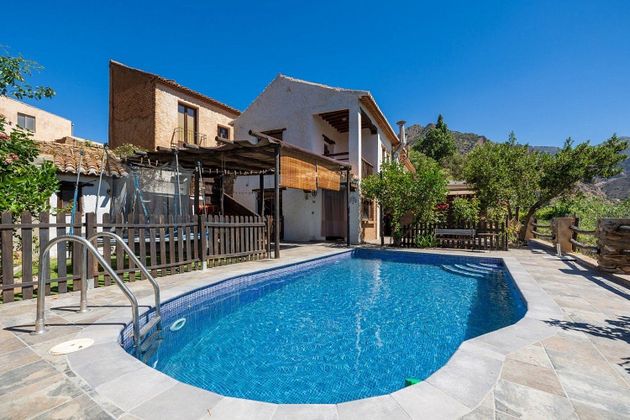 Foto 1 de Venta de casa en Nigüelas de 4 habitaciones con terraza y piscina