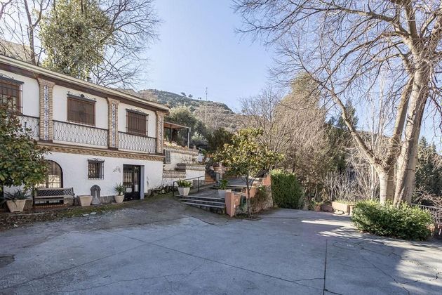 Foto 2 de Venta de chalet en calle Granada de 10 habitaciones con piscina y jardín