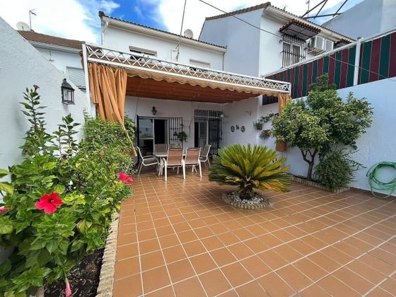 Foto 1 de Venta de casa adosada en calle Sevilla de 4 habitaciones con terraza y garaje