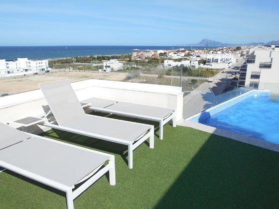 Foto 1 de Ático en venta en Oliva Playa de 3 habitaciones con terraza y piscina