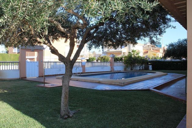 Foto 1 de Piso en venta en Oliva Playa de 2 habitaciones con terraza y piscina