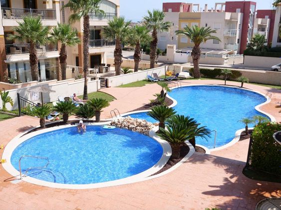 Foto 2 de Piso en venta en calle Alfons X El Savi de 2 habitaciones con terraza y piscina