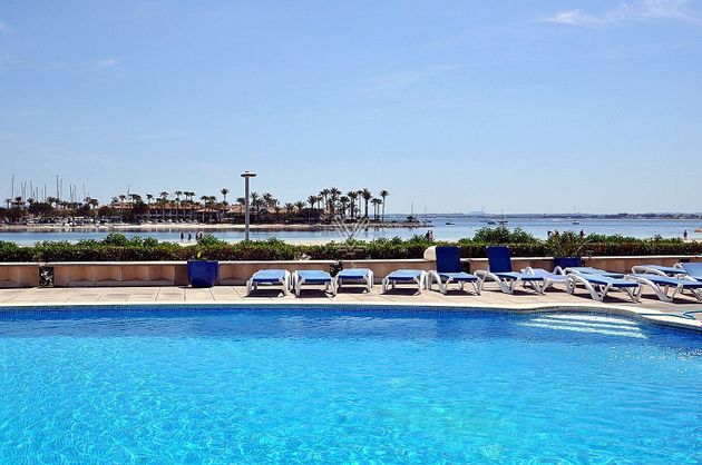 Foto 2 de Piso en venta en Port d'Alcúdia - Platja d'Alcúdia de 2 habitaciones con terraza y piscina