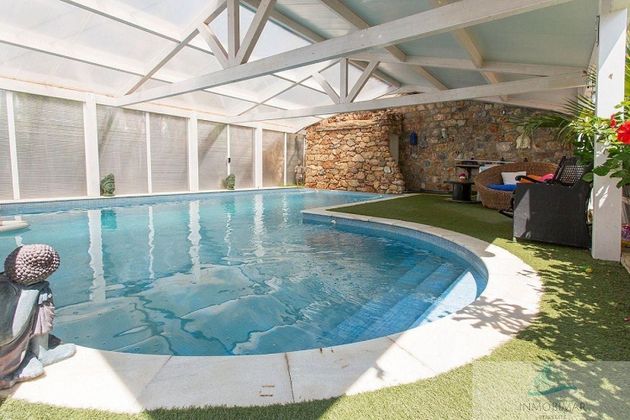 Foto 1 de Venta de chalet en Velilla-Taramay de 4 habitaciones con terraza y piscina