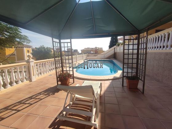 Foto 1 de Chalet en venta en La Cala del Moral de 4 habitaciones con terraza y piscina