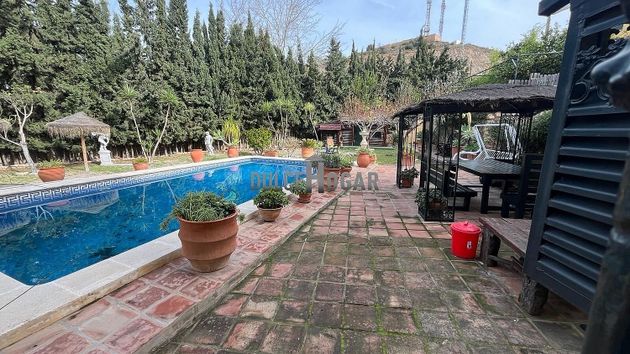 Foto 1 de Chalet en venta en La Cala del Moral de 7 habitaciones con terraza y piscina