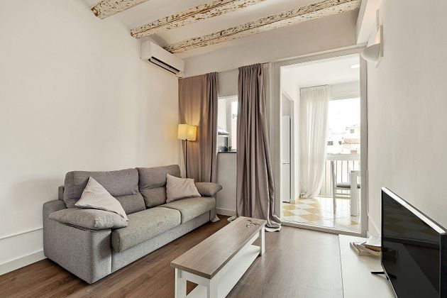 Foto 1 de Venta de piso en Vila de Gràcia de 3 habitaciones con muebles y aire acondicionado