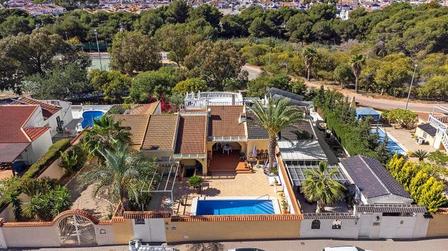 Foto 1 de Casa adossada en venda a avenida De Suecia de 3 habitacions amb terrassa i piscina