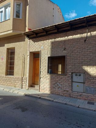 Foto 1 de Venta de casa adosada en calle Mayor de 2 habitaciones con terraza