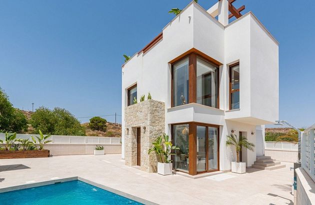 Foto 1 de Casa en venda a Cala Marqués de 3 habitacions amb terrassa i piscina