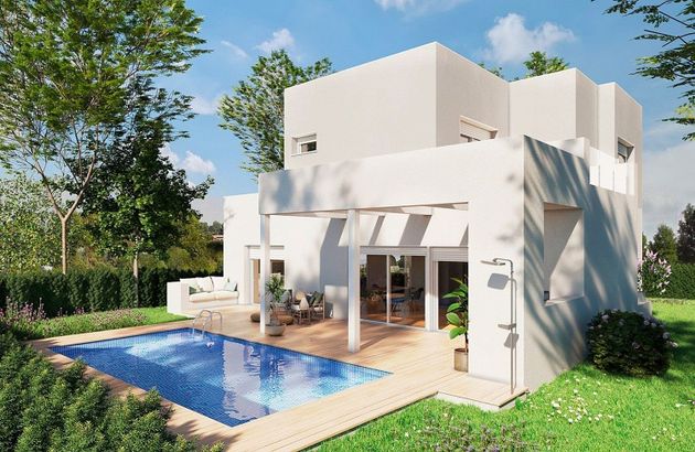 Foto 2 de Xalet en venda a Oliva Nova de 3 habitacions amb terrassa i piscina