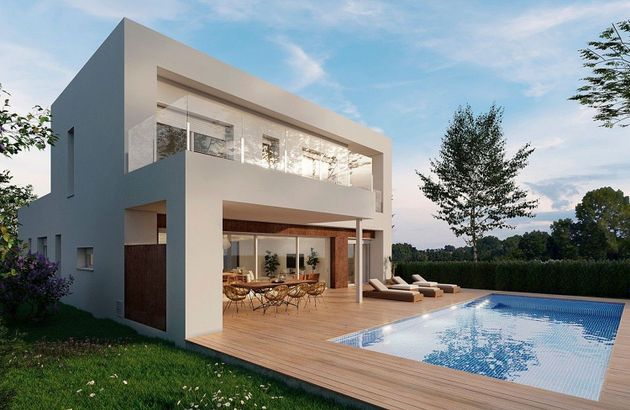 Foto 2 de Xalet en venda a Oliva Nova de 5 habitacions amb terrassa i piscina