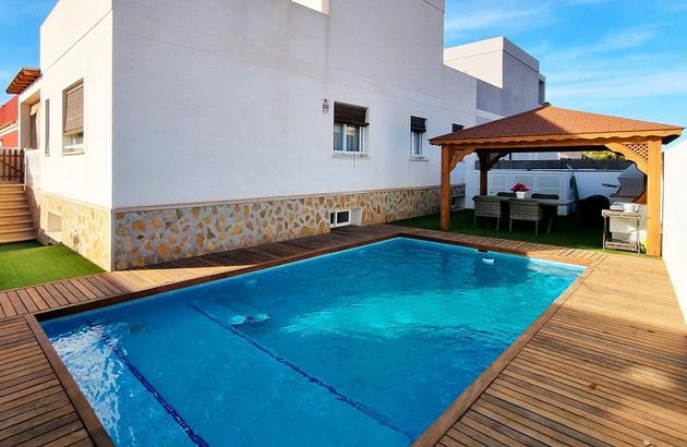 Foto 1 de Casa en venta en Gran Alacant de 5 habitaciones con terraza y piscina
