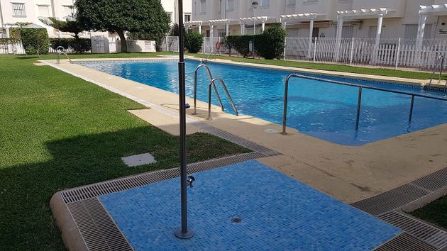 Foto 1 de Casa adosada en venta en calle Nuñez de Balboa de 2 habitaciones con terraza y piscina