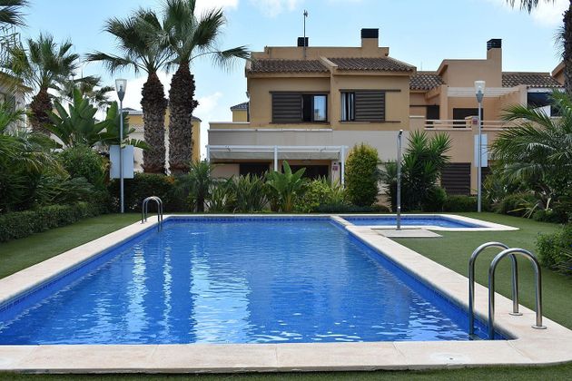 Foto 1 de Venta de casa en Cabo Roig - La Zenia de 2 habitaciones con terraza y piscina