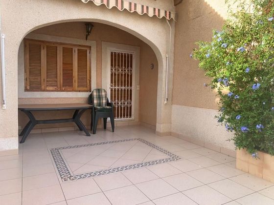 Foto 2 de Casa adosada en venta en Los Arenales del Sol de 3 habitaciones con terraza y piscina