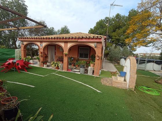 Foto 1 de Casa rural en venta en Carlota (La) de 3 habitaciones con terraza y piscina