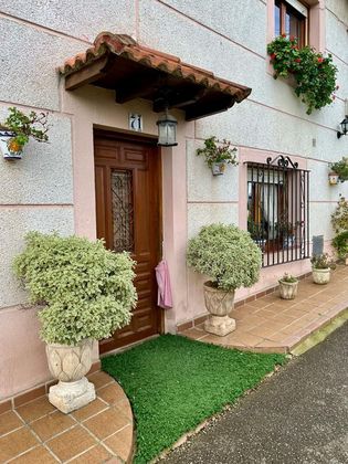 Foto 1 de Casa adossada en venda a calle Castillo Siete Villas de 3 habitacions amb jardí i balcó