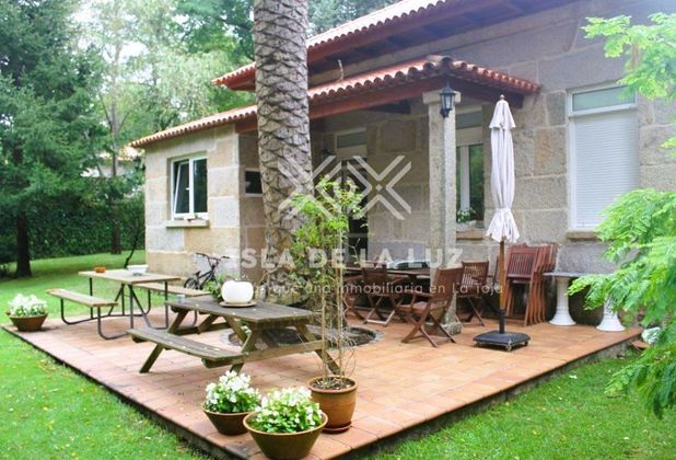 Foto 1 de Xalet en venda a calle La Toja de 10 habitacions amb terrassa i jardí