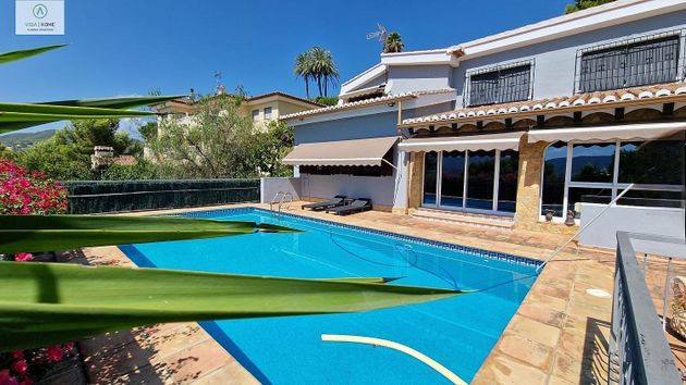 Foto 1 de Venta de chalet en Real de Gandía de 4 habitaciones con terraza y piscina
