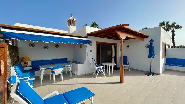 Foto 1 de Casa adosada en venta en calle La Perla de 2 habitaciones con terraza y piscina