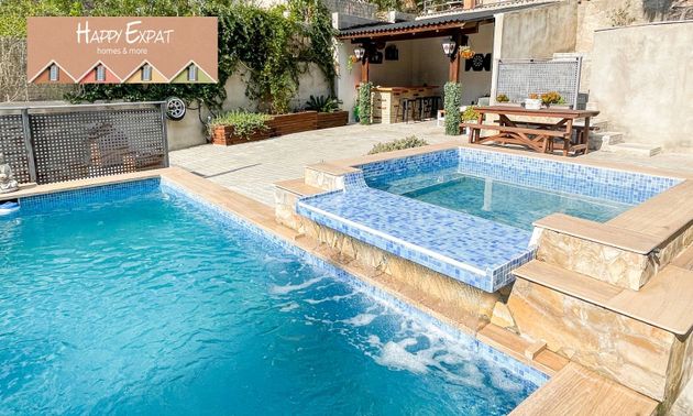 Foto 1 de Venta de chalet en Mas Milà de 5 habitaciones con terraza y piscina