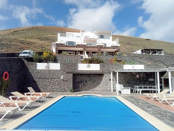 Foto 1 de Xalet en venda a La Asomada de 9 habitacions amb terrassa i piscina