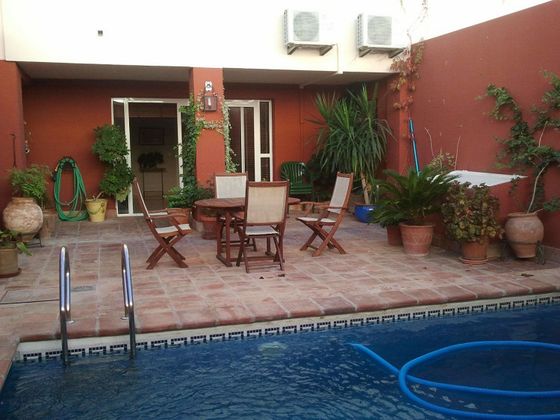 Foto 1 de Casa adossada en venda a Écija de 3 habitacions amb terrassa i piscina