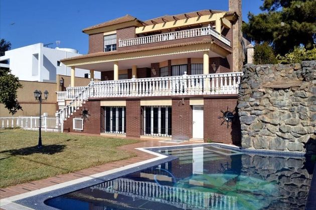 Foto 1 de Chalet en venta en El Brillante -El Naranjo - El Tablero de 4 habitaciones con terraza y piscina