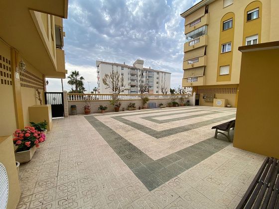 Foto 2 de Venta de piso en Playa del Rincón de 2 habitaciones con terraza y piscina