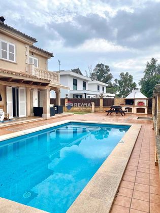 Foto 2 de Casa adossada en venda a Muro de 4 habitacions amb piscina i garatge