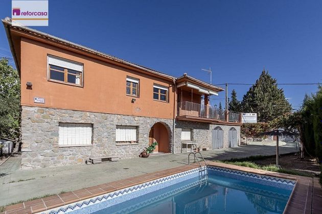Foto 1 de Casa en venta en calle Nuevo de 6 habitaciones con piscina y garaje