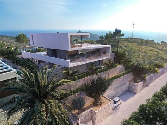 Foto 1 de Chalet en venta en El Portet - Pla de Mar de 4 habitaciones con terraza y piscina