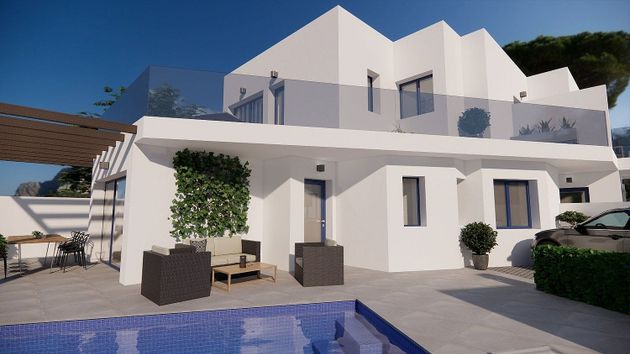 Foto 2 de Casa adossada en venda a avenida De la Luz de 3 habitacions amb terrassa i piscina