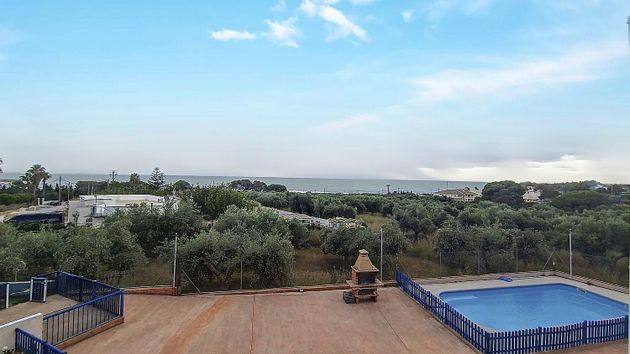 Foto 2 de Casa en venda a Les Cases d'Alcanar de 2 habitacions amb terrassa i piscina