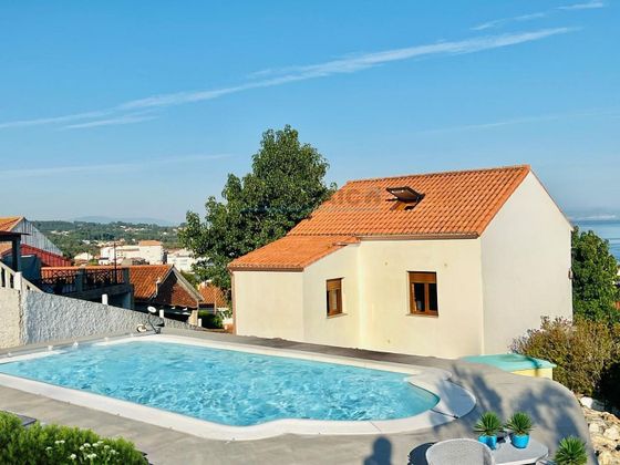 Foto 1 de Xalet en venda a Ribeira de 3 habitacions amb terrassa i piscina