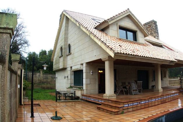 Foto 2 de Venta de casa en Alcabre - Navia - Comesaña de 4 habitaciones con terraza y piscina