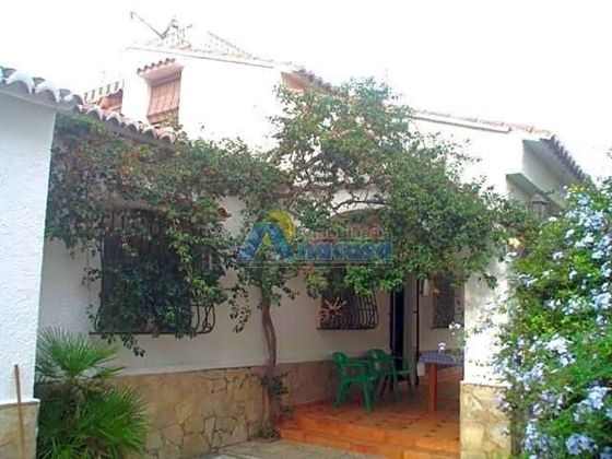 Foto 2 de Chalet en venta en Oliva Playa de 5 habitaciones con terraza y garaje