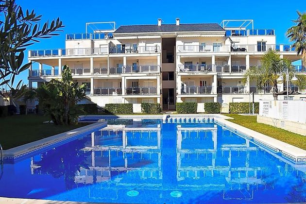 Foto 1 de Dúplex en venda a Oliva Playa de 3 habitacions amb terrassa i piscina