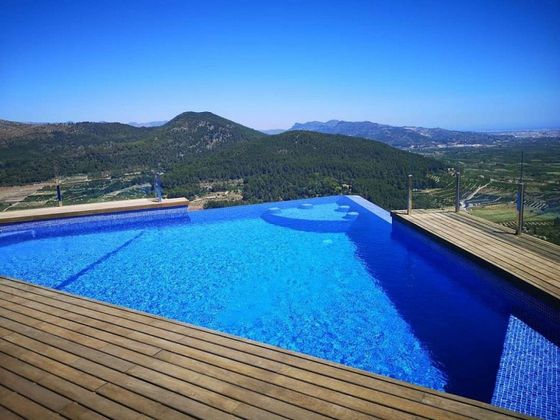 Foto 2 de Chalet en venta en Ador de 5 habitaciones con terraza y piscina
