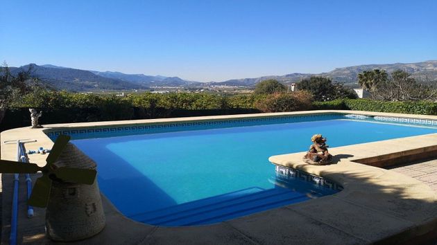 Foto 2 de Venta de casa en Real de Gandía de 4 habitaciones con piscina y aire acondicionado