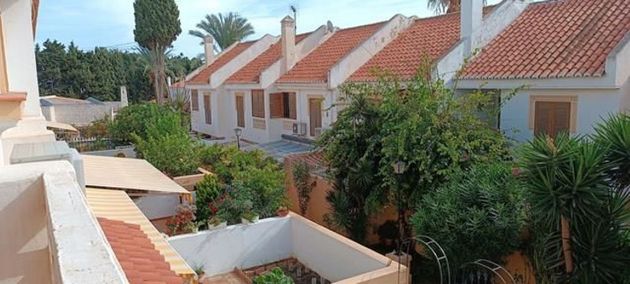 Foto 1 de Casa adossada en venda a Montemar de 4 habitacions amb terrassa i garatge