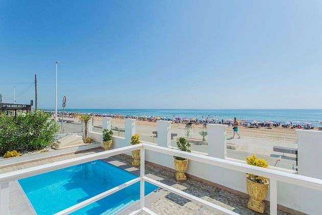 Foto 1 de Casa en venda a Torrelamata - La Mata de 6 habitacions amb terrassa i piscina