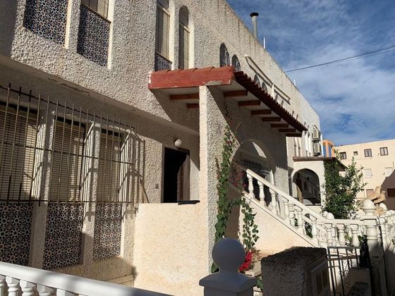 Foto 1 de Venta de casa en Torrelamata - La Mata de 3 habitaciones con terraza y balcón