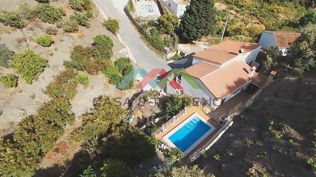 Foto 1 de Casa en venda a Viñuela de 5 habitacions amb terrassa i piscina