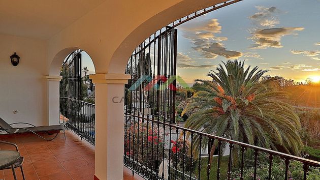 Foto 1 de Chalet en venta en Benajarafe – Almayate de 7 habitaciones con terraza y piscina