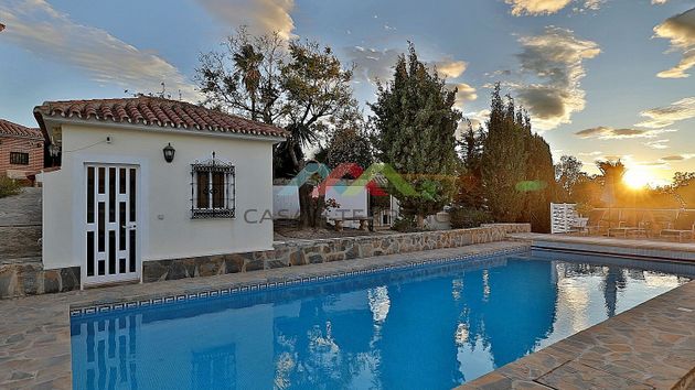 Foto 2 de Chalet en venta en Benajarafe – Almayate de 7 habitaciones con terraza y piscina