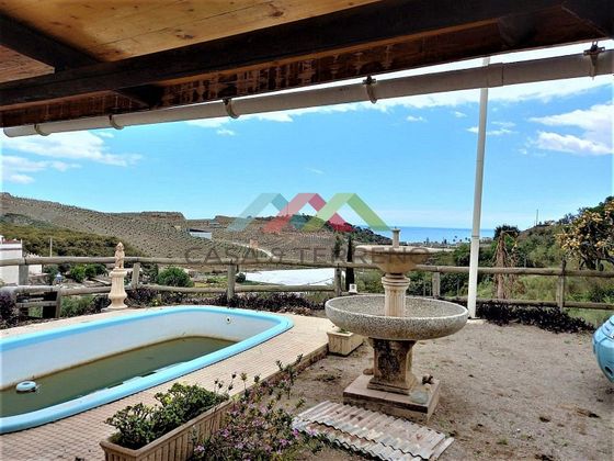 Foto 1 de Casa en venta en Benajarafe – Almayate de 2 habitaciones con terraza y piscina