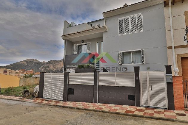 Foto 1 de Casa en venta en Alfarnate de 4 habitaciones con terraza y garaje